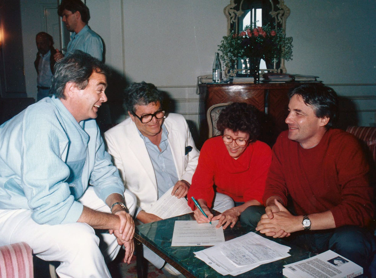 Golan second on the left, Myriam Bru & Andrzej Żuławski signing the Tiger contract, 1987, photo: courtesy of Myriam Bru